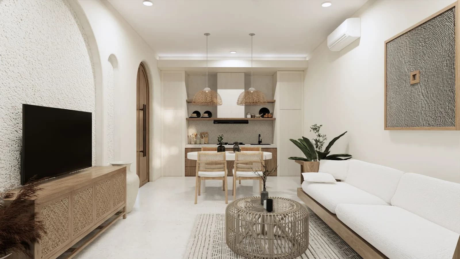 Intérieur de villa balinaise meublée en teck et rotin, typique des locations longue durée